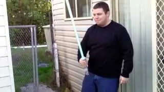 Breaking a green removable blade force FX Star Wars lightsaber durability test