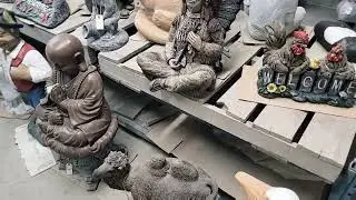 015 - Visiting the concrete statue business.