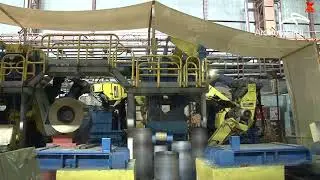 Production process of colored corrugated iron and roofing corrugated iron