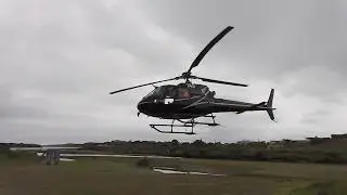Kapiti Heliworx AS350B2 ZK-IAG returning to Waikanae River mouth estuary from Kapiti Island