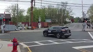 Level Crossing Malfunctions, then train comes