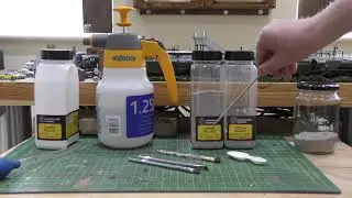 Laying track ballast on a model railway