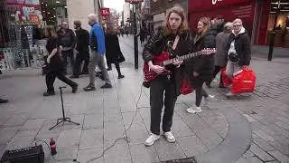 Christian plays White Room by Cream in Church Street Liverpool