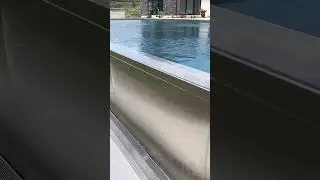 Infinity edge stainless steel swimming pool