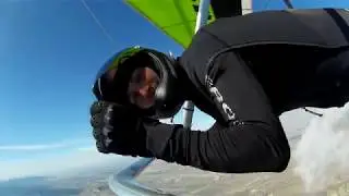 Spectacular hang gliding fly over cloud of Crimea