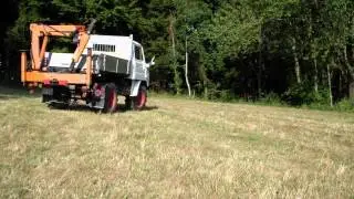 Unimog 411  Masterkran TCSK 1600