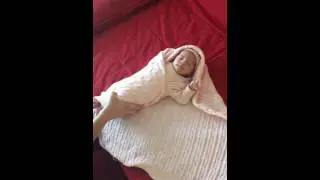How to Do a Hooded Swaddle for a Baby Without the Arms Coming Loose