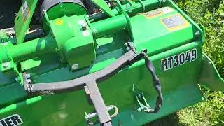Tiller mounted trailer hitch. 