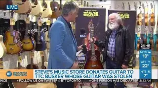 Steve's Music Store donates guitar to TTC busker Roger Ellis