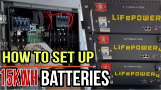 Installing batteries for solar array. Whole-home backup with Sol-Ark 15k & EG4 & 6800W solar panels.