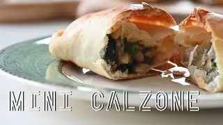 Mini calzone, a pizza dough filled with mushrooms and spinach