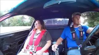 Ben takes Kerry Anne for a ride in the race car!