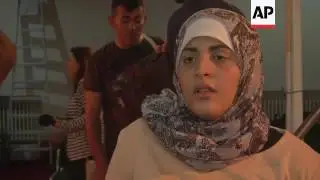 Syria refugees perform play about fleeing conflict