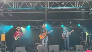 Blue Gene Sinksen 2024 op het podium bij Den Bras