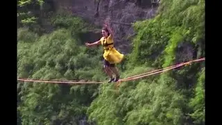 Women walk tightrope more than 4,000 feet above ground in high heels