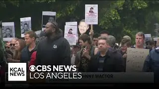 Family and friends of the late Johnny Wactor march Downtown Los Angeles