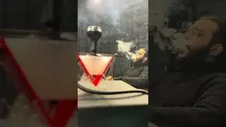 V Fire Acrylic Hookah in striking red! Its vibrant color make it perfect addition to any space.