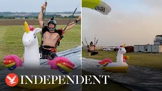 Skydiver lands directly on inflatable unicorn to win unique competition
