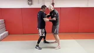 Escape from neck clinch / neck pulling hand