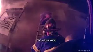Helmet cam shows dramatic rescue from burning apartments in Michigan