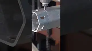 cutting industrial silver metal pipe using automatic laser machine