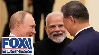 Putin, Modi and Xi cozy up at China summit