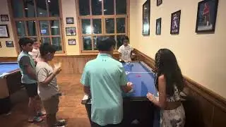 Playing air hockey with friends at Riu Bambu Dominican Republic part 2