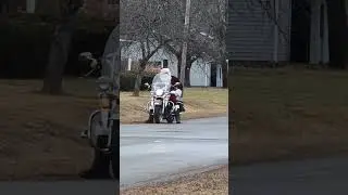 Santa on a Harley Davidson Motorcycle.....