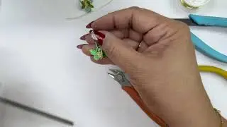 VENTA MG #50: ARETES EN ALAMBRISMO MARIPOSA