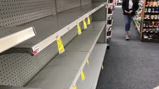 Panic-buying as shoppers empty store shelves amid coronavirus crisis