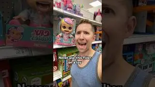 I cannot stop using the mouth swap filter on this doll in a toy store #shorts