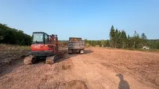 Stripping top soil with my Kubota kx57 for my dream shop