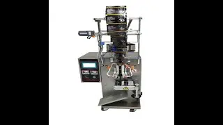 Automatic measuring cup type particle packaging machine