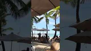 Vibrant local life on Cabarete Beach, Dominican Republic by Kibayo