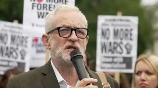 Protesters urge the UK government to help Afghan refugees
