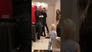 slipknot korn corey Taylor and Joahnathan Davis warming up in front of a kid