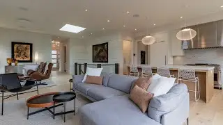 Inside a vibrant custom villa in Aspen Ridge Heights, Calgary.