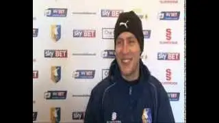 Alan Marriott shares a short story with the media before today's press conference