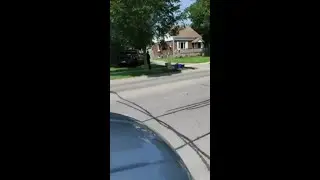 A woman issued a ticket for parking on the green grass in her own House by Parking enforcer.