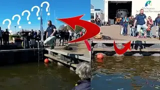Waarom Springt Deze man in het Koude Havenwater?