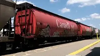 CN 301 w/CN Engines 3396 (ex BNSF/GECX 4575) & 3929 (ex CREX 1308) lead this long 700 axle, WB Mixed