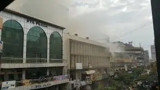 Unidentified  outbreak of fire broke up this morning  at city  at City House  building in Kampala.
