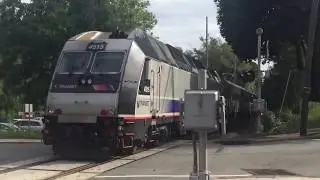 NJ transit train at river edge station