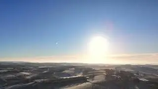 Bright sun on frozen fields — SOHRA
