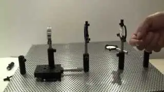 A simple refracting telescope built on an optical bench.