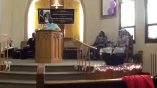 Rev Raymond Burt preaching