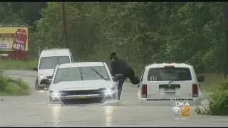 Passerby Rescues Driver Stranded In Flood Waters