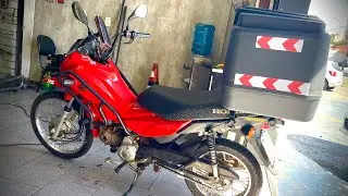 COMO ABASTECER A POP 110 COM BAÚ 80 LITROS ?