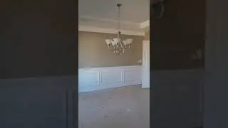 Realtor Ebony King doing a walkthrough with clients in luxury community