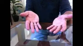 Coin through glass table